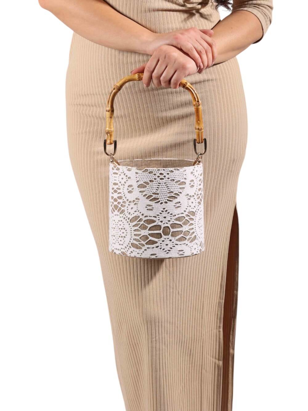 bucket bag made with white lace featuring a bamboo handle